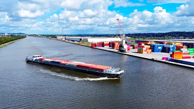 © PAL-VISIBLE_TRILOGIPORT_OUPEYE_Transport conteneurs Canal Albert